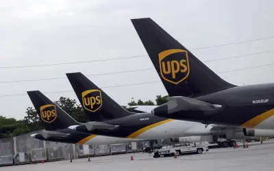 Some UPS and FedEx planes are grounded. What does that mean for holiday shipping?