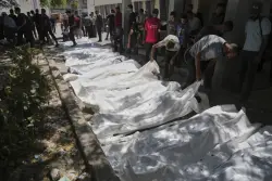 UN food agency says Israeli tanks and snipers opened fire on a crowd seeking aid in Gaza