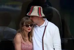 Taylor Swift and Travis Kelce are ‘always kissing’ and ‘always touching,’ says pal Erin Andrews