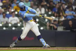 Yelich, Vaughn homers help power Brewers to an 8-3 win over the Nationals